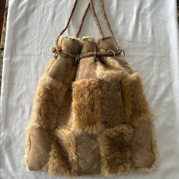 Genuine shearling patchwork drawstring bag. - Picture 2 of 4
